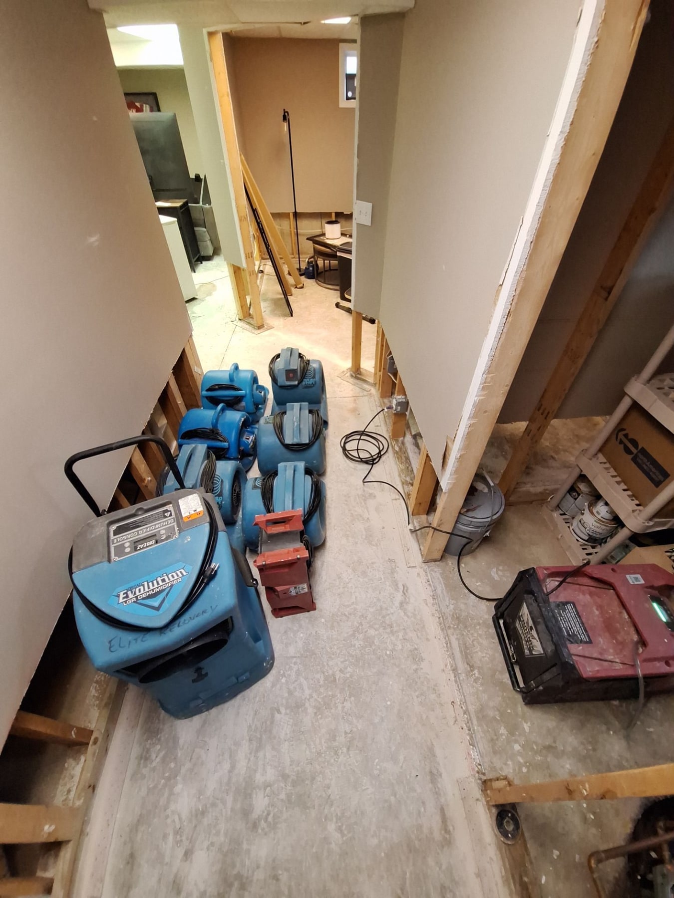 RWC air movers and dehumidification equipment positioned throughout an affected property